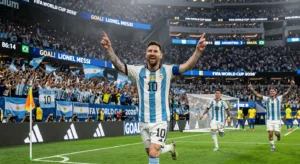 Lionel Messi raises his arms after scoring his record-breaking goal for Argentina against Austria at AT&T Stadium, Arlington, Texas.